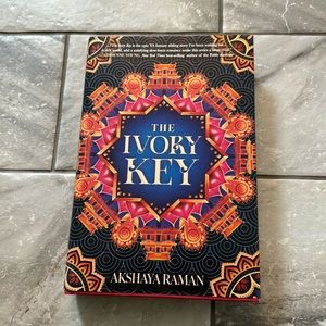 Owlcrate Exclusive Ivory Key by: Akshaya Raman